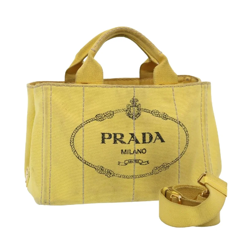 Prada nylon backpacks with a padded laptop compartment for travel and studyPRADA Canapa PM Hand Bag Canvas 2way Yellow Auth 79532