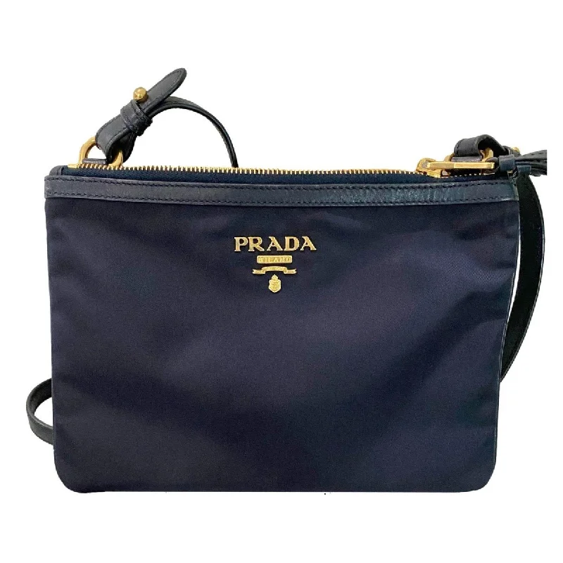 Ladies Prada Re - Edizione 2005 bags with a star - shaped charm for a playful touchPrada Tessuto Nylon Blue Zip Calf Leather Cross Body Bag 1BH046