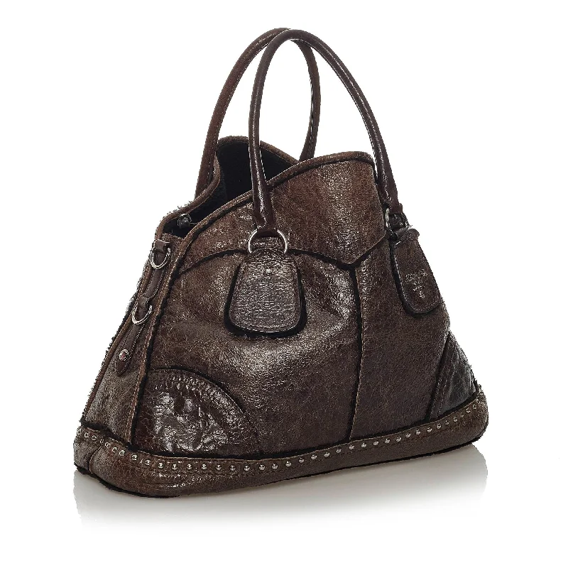 Prada Cahier bags featuring the signature triangular logo plaquePrada Cervo Shine Tote Bag 29245