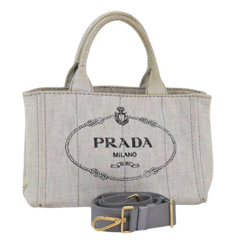 Prada bags with a snap - button closure and a decorative charm for a fashionable lookPRADA Canapa PM Hand Bag Canvas 2way White Auth 77362