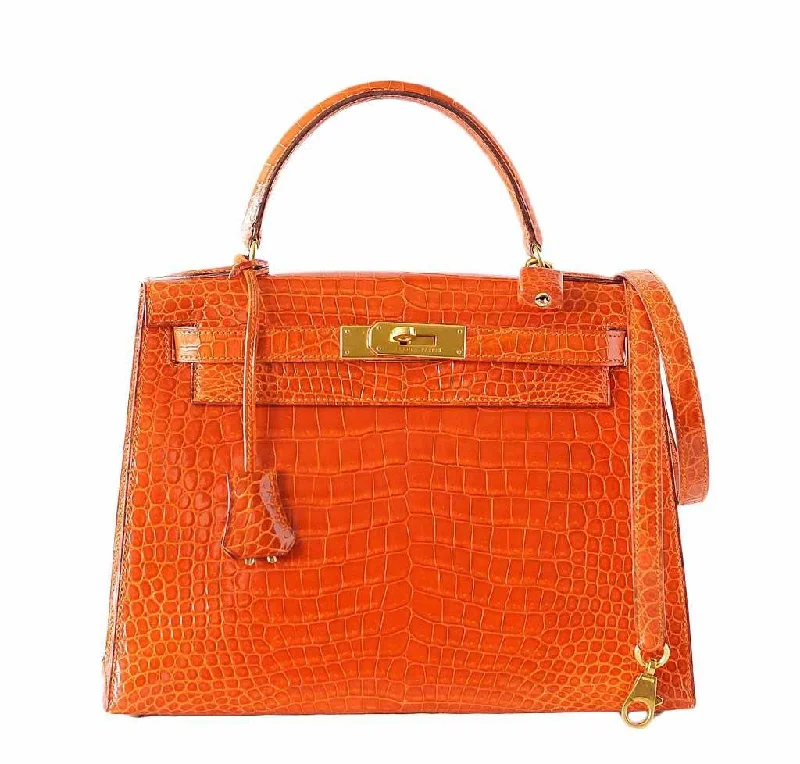 Hermès Kelly Bags in a soft ivory color for an elegant aestheticHermès Kelly 32 Orange Crocodile Bag