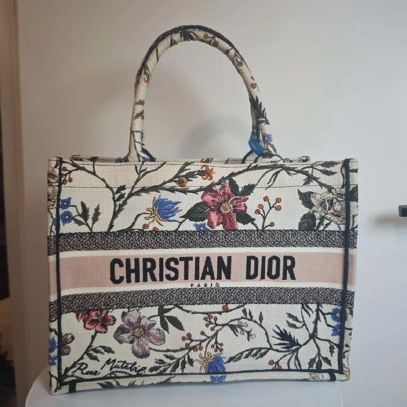 Contemporary Christian Dior handbags with a unique shapeChristian Dior Book Tote Multicolor Embroidered Floral Canvas Large